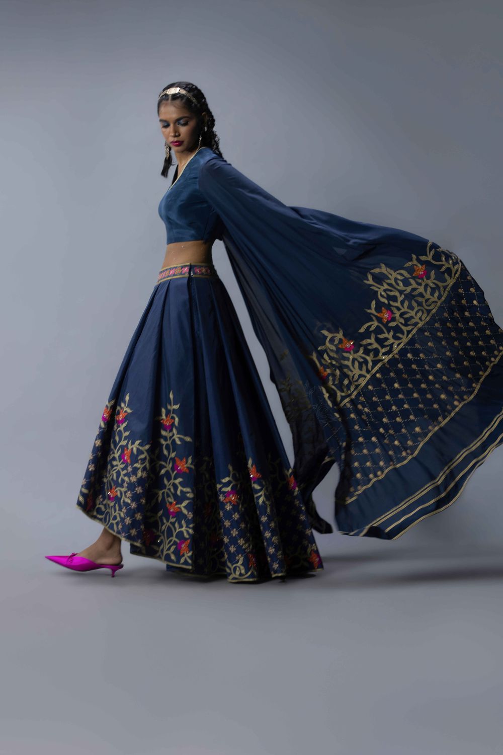 Embroidered Statement Blouse With An Asymmetric Lehenga