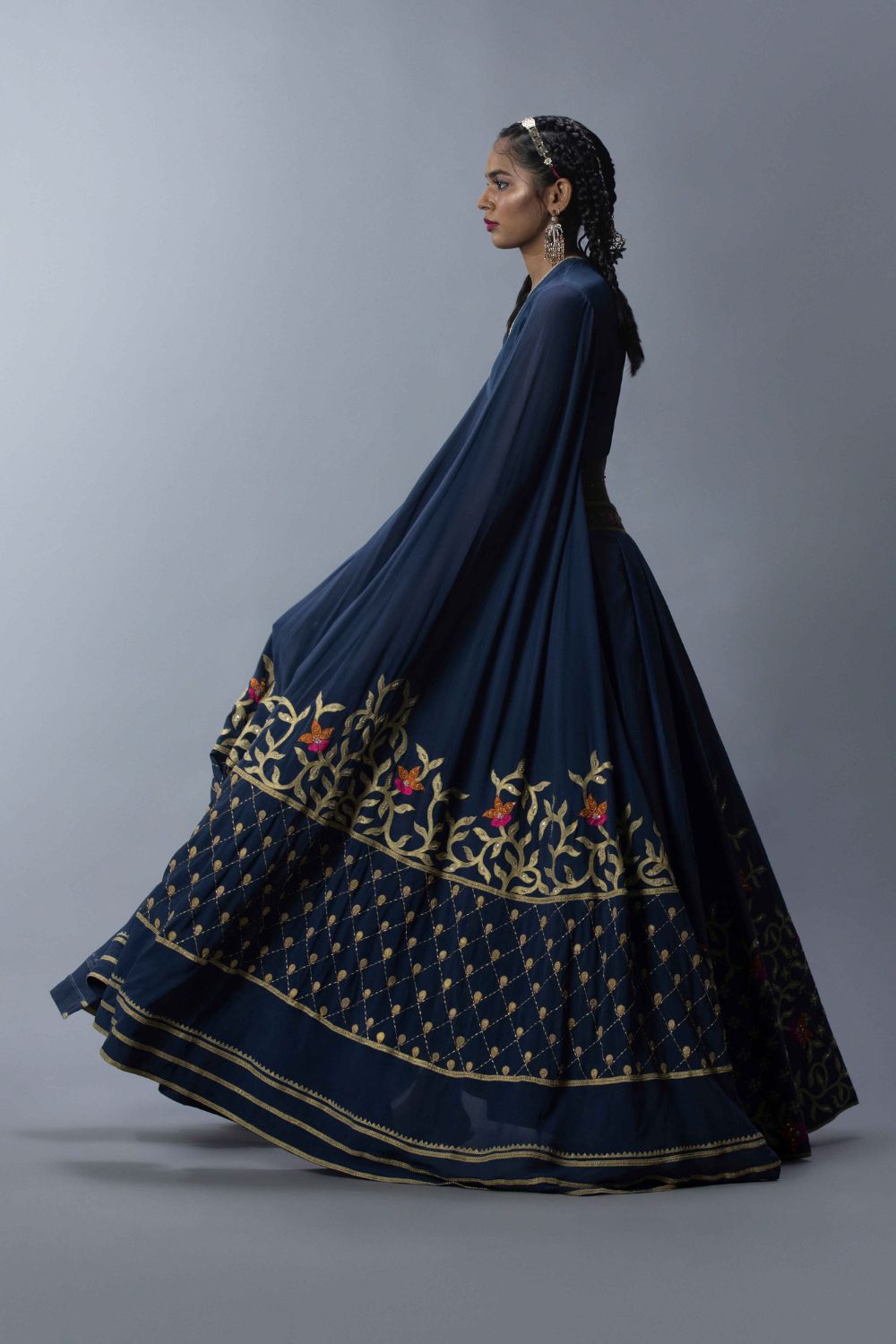 Embroidered Statement Blouse With An Asymmetric Lehenga