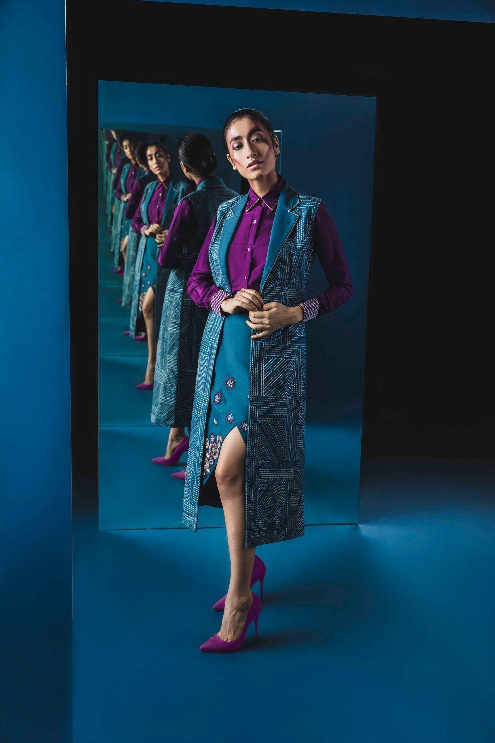 Long Jacket With Stitch Line Details With A Steel Blue Shirt And Overlap Skirt
