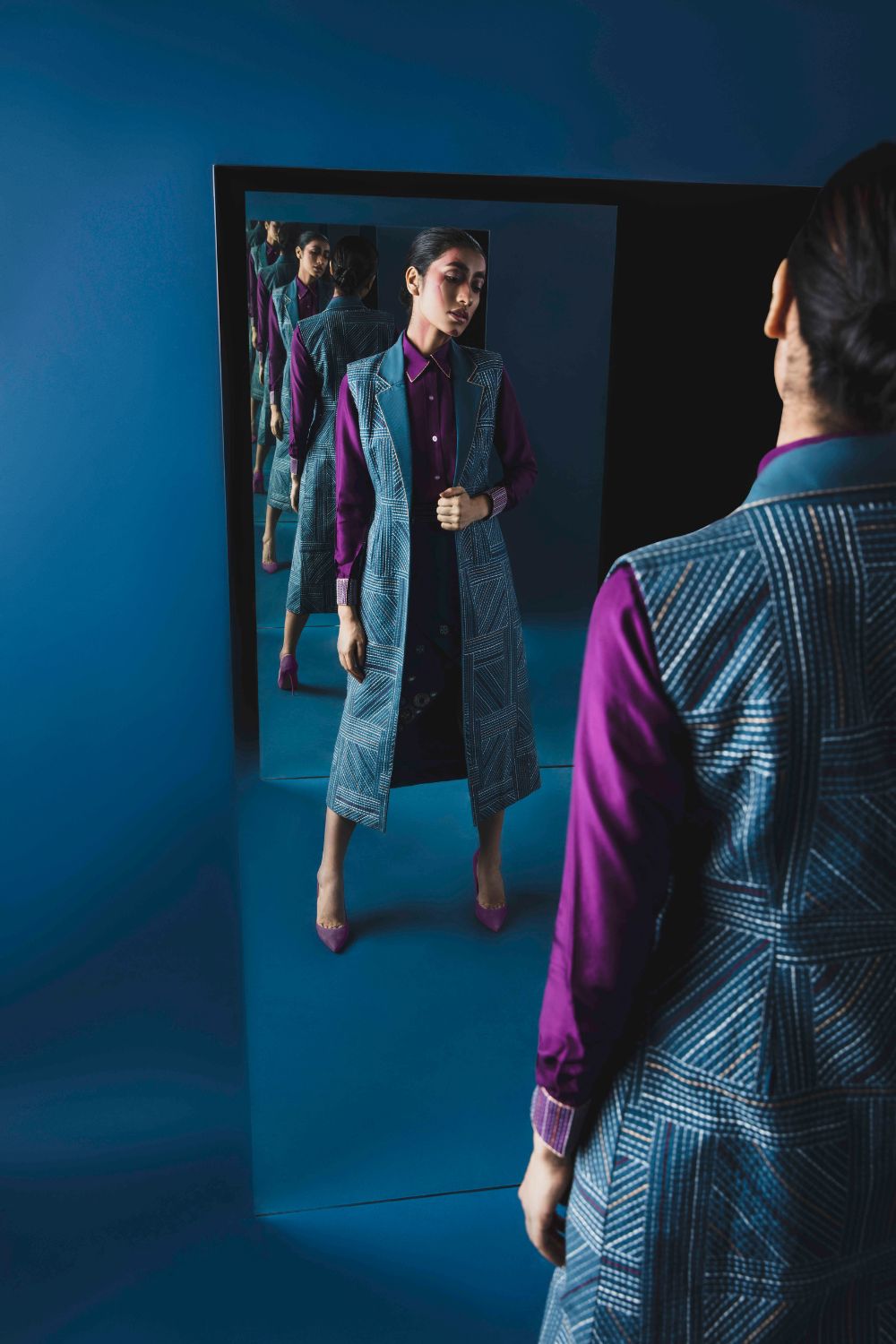 Long Jacket With Stitch Line Details With A Steel Blue Shirt And Overlap Skirt