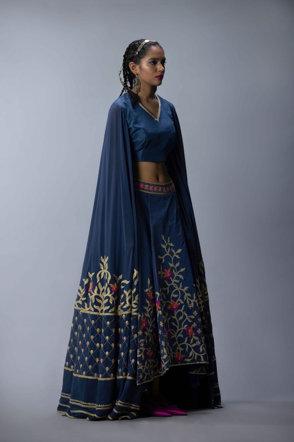 Embroidered Statement Blouse With An Asymmetric Lehenga
