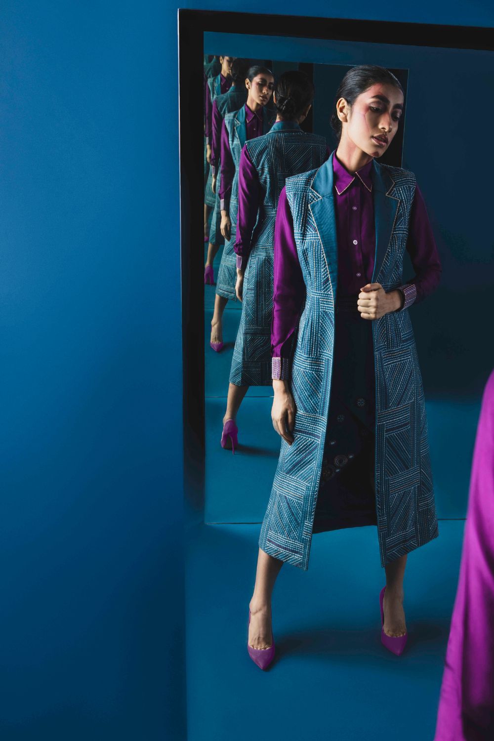 Long Jacket With Stitch Line Details With A  Steel Blue Shirt And Overlap Skirt