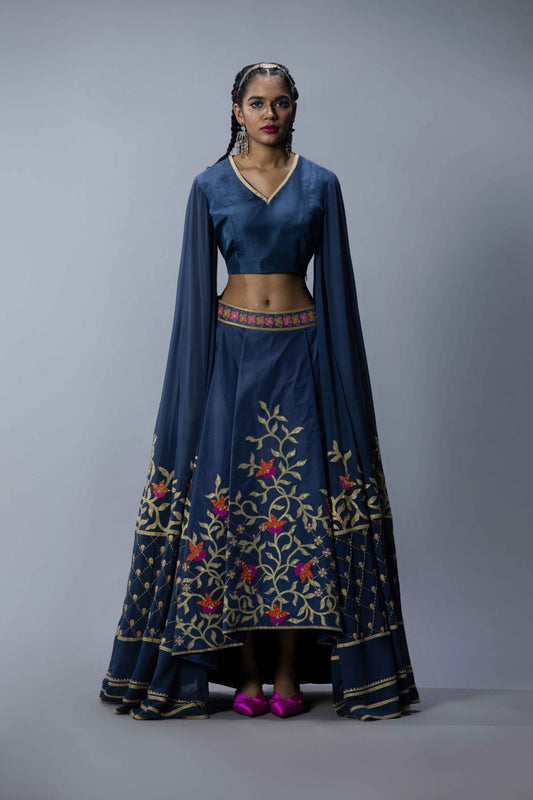 Embroidered Statement Blouse With An Asymmetric Lehenga