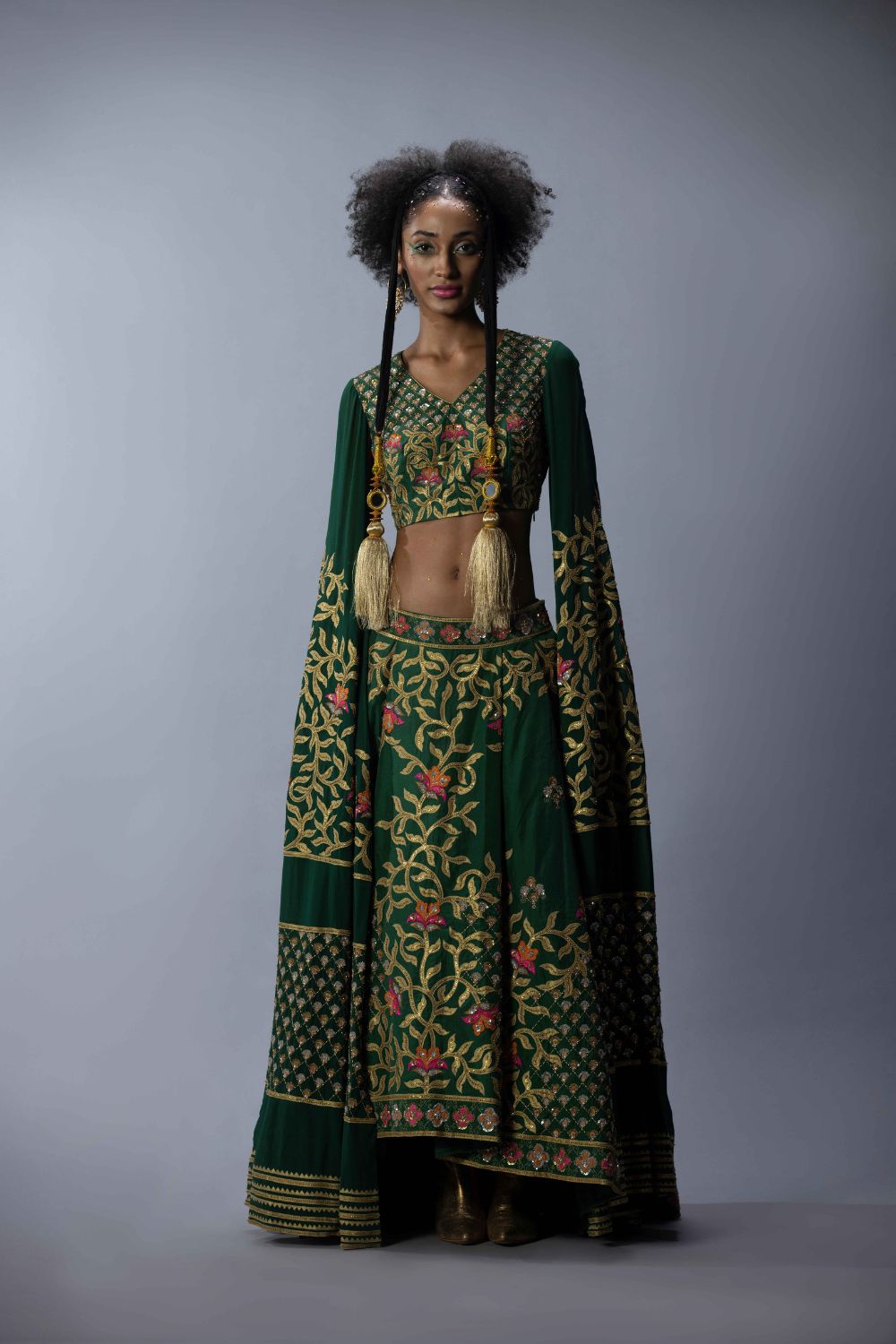 Embroidered Statement Blouse With An Asymmetric Lehenga