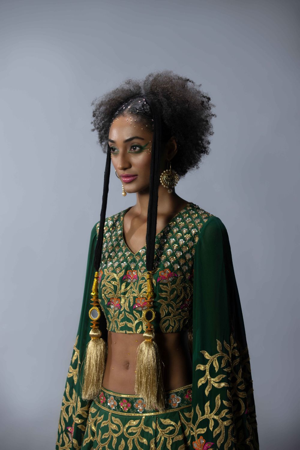 Embroidered Statement Blouse With An Asymmetric Lehenga