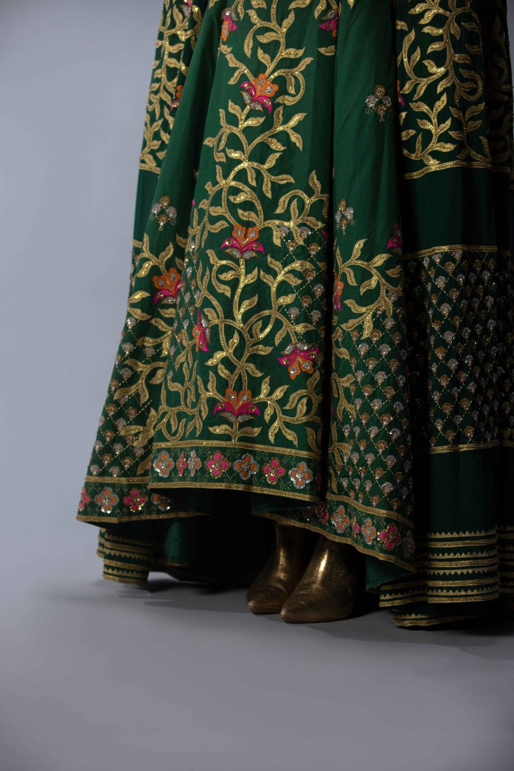 Embroidered Statement Blouse With An Asymmetric Lehenga