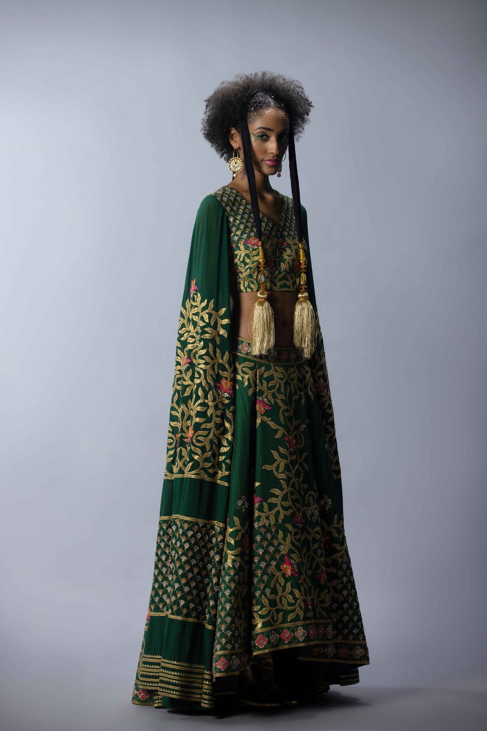 Embroidered Statement Blouse With An Asymmetric Lehenga