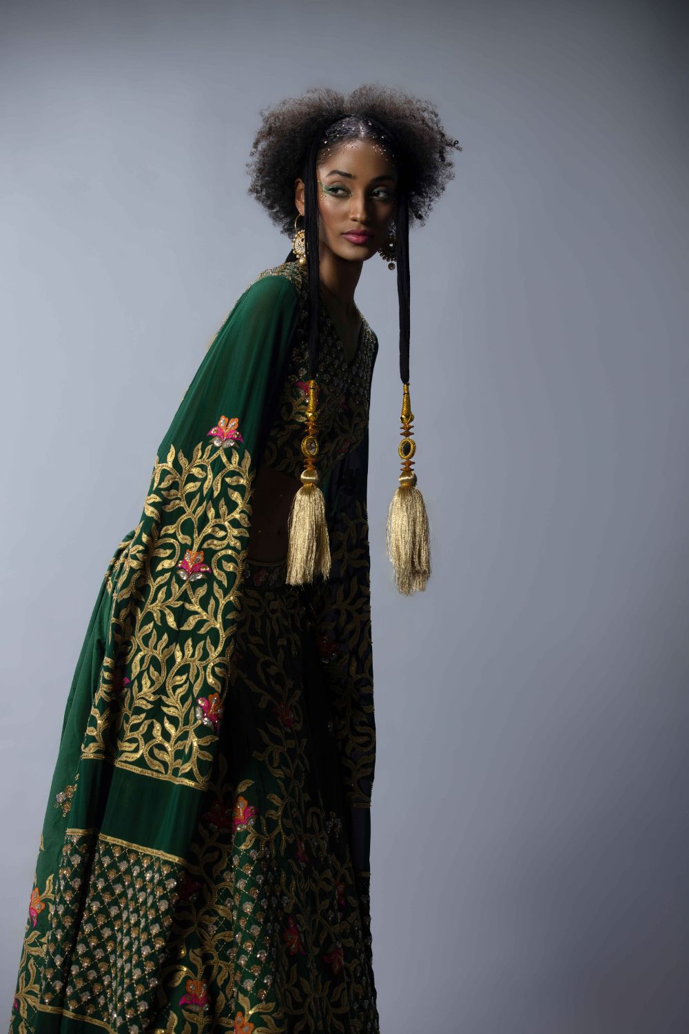 Embroidered Statement Blouse With An Asymmetric Lehenga